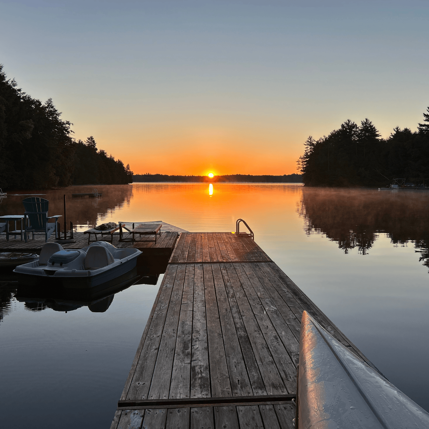 sunrise on the dock of loon bay serenity on lake chandos